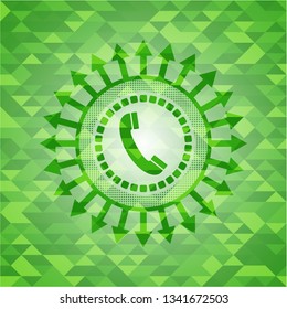 old phone icon inside green emblem with triangle mosaic background