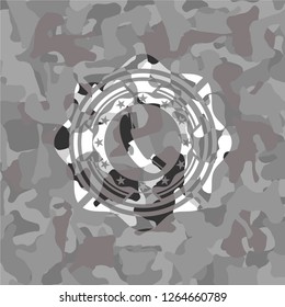 old phone icon inside grey camouflage emblem