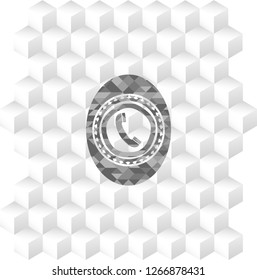 old phone icon inside grey badge with geometric cube white background