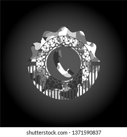 old phone icon inside grey camo emblem
