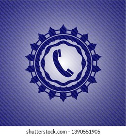 old phone icon inside jean or denim emblem or badge background
