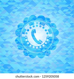 old phone icon inside light blue emblem with triangle mosaic background