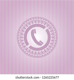 old phone icon inside pink emblem