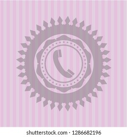 old phone icon inside pink emblem