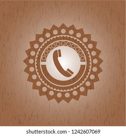 old phone icon inside realistic wood emblem