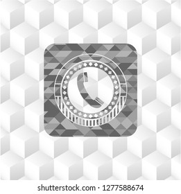 old phone icon inside realistic grey emblem with geometric cube white background