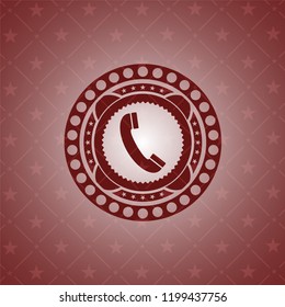 old phone icon inside red emblem