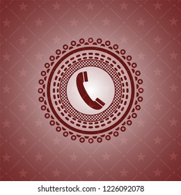 old phone icon inside red emblem