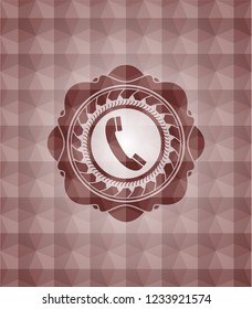 old phone icon inside red seamless emblem or badge with geometric pattern background.