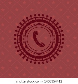 old phone icon inside red icon or emblem