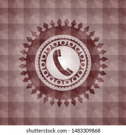 old phone icon inside red geometric emblem. 