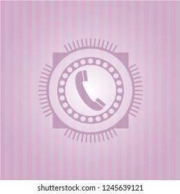 old phone icon inside retro style pink emblem