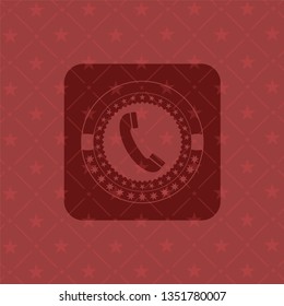 old phone icon inside retro red emblem