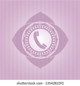 old phone icon inside retro style pink emblem