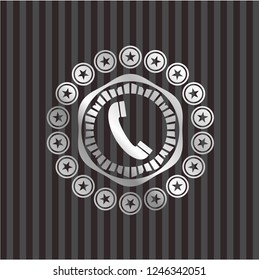 old phone icon inside silver shiny emblem