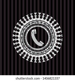 old phone icon inside silvery badge or emblem
