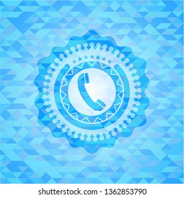 old phone icon inside sky blue emblem with triangle mosaic background
