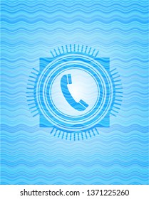 old phone icon inside sky blue water style emblem.
