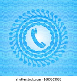 old phone icon inside sky blue water wave badge.