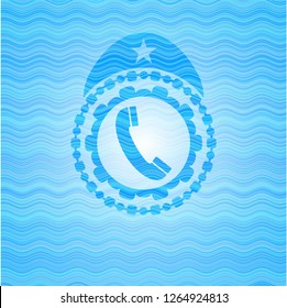 old phone icon inside water wave style badge.