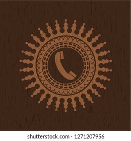 old phone icon inside wooden emblem. Vintage.