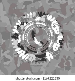 old phone icon on grey camo pattern