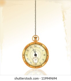 Old pocket watch on golden chain
