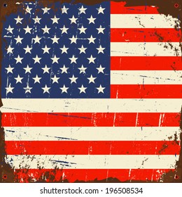 Old rusty metal sign with the US flag.