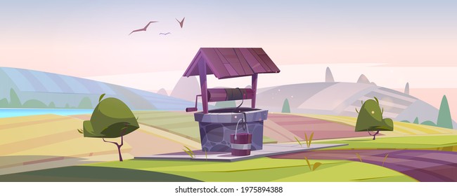 Old stone well with drinking water on green hill with farm fields around. Summer early morning landscape with vintage rural well with wooden roof, pulley and bucket on rope Cartoon vector illustration