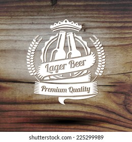 Old styled beer label for your beer business, shop, restaurant etc. On old wooden texture. Vector