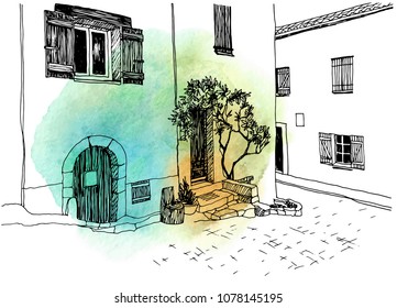 Old town street in hand drawn sketch style. Vector illustration. Small European city. Urban landscape on blob watercolor background
