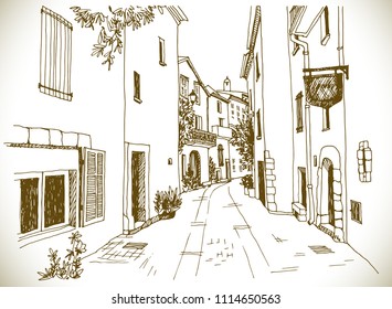 Old town street in hand drawn sketch style. Sepia vector illustration. Small European city. Urban landscape on vintage background