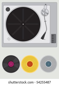 Old turntable with Black, Platinum and Silver record