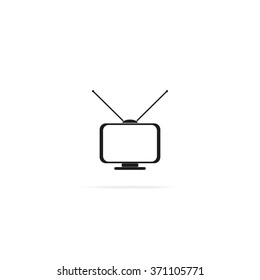 Old TV with antennas. Flat icon.
