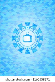 old tv, television icon inside sky blue emblem. Mosaic background