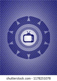 old tv, television icon inside emblem with denim texture