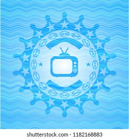 old tv, television icon inside sky blue water wave style emblem.