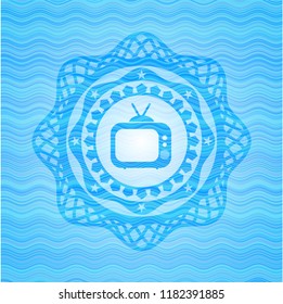 old tv, television icon inside sky blue water emblem.