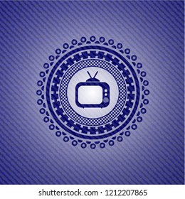 old tv, television icon inside badge with jean texture