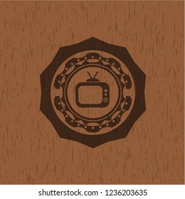 old tv, television icon inside wooden emblem. Retro