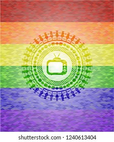 old tv, television icon inside emblem on mosaic background with the colors of the LGBT flag