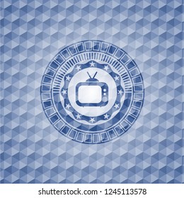 old tv, television icon inside blue badge with geometric pattern.