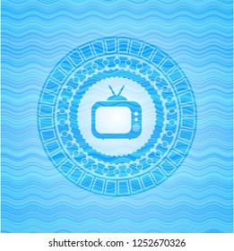 old tv, television icon inside water wave concept badge background.