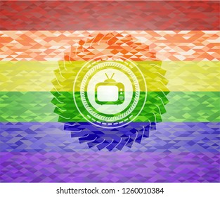 old tv, television icon inside emblem on mosaic background with the colors of the LGBT flag