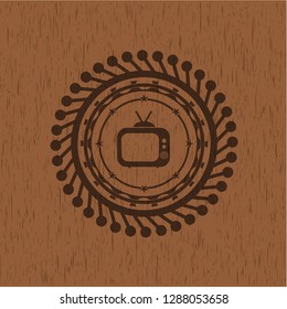 old tv, television icon inside vintage wood emblem