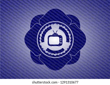 old tv, television icon inside emblem with jean texture
