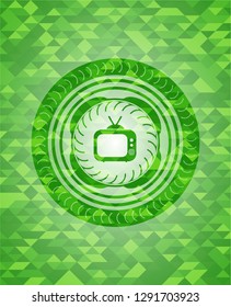 old tv, television icon inside green emblem with mosaic background