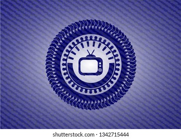 old tv, television icon inside denim background