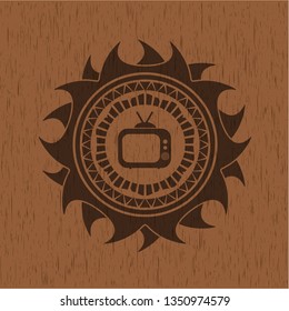 old tv, television icon inside wooden emblem