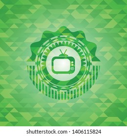 old tv, television icon inside green emblem. Mosaic background